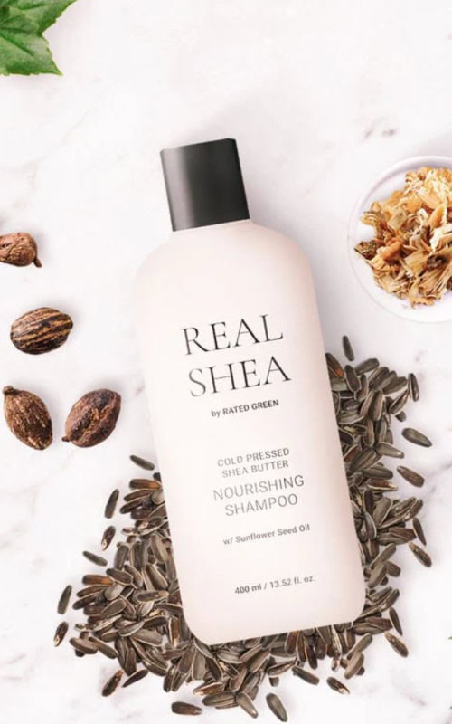 real shea butter<br>nourishing shampoo w / sunflower seed oil 400ml